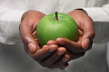 Holding Green Apple